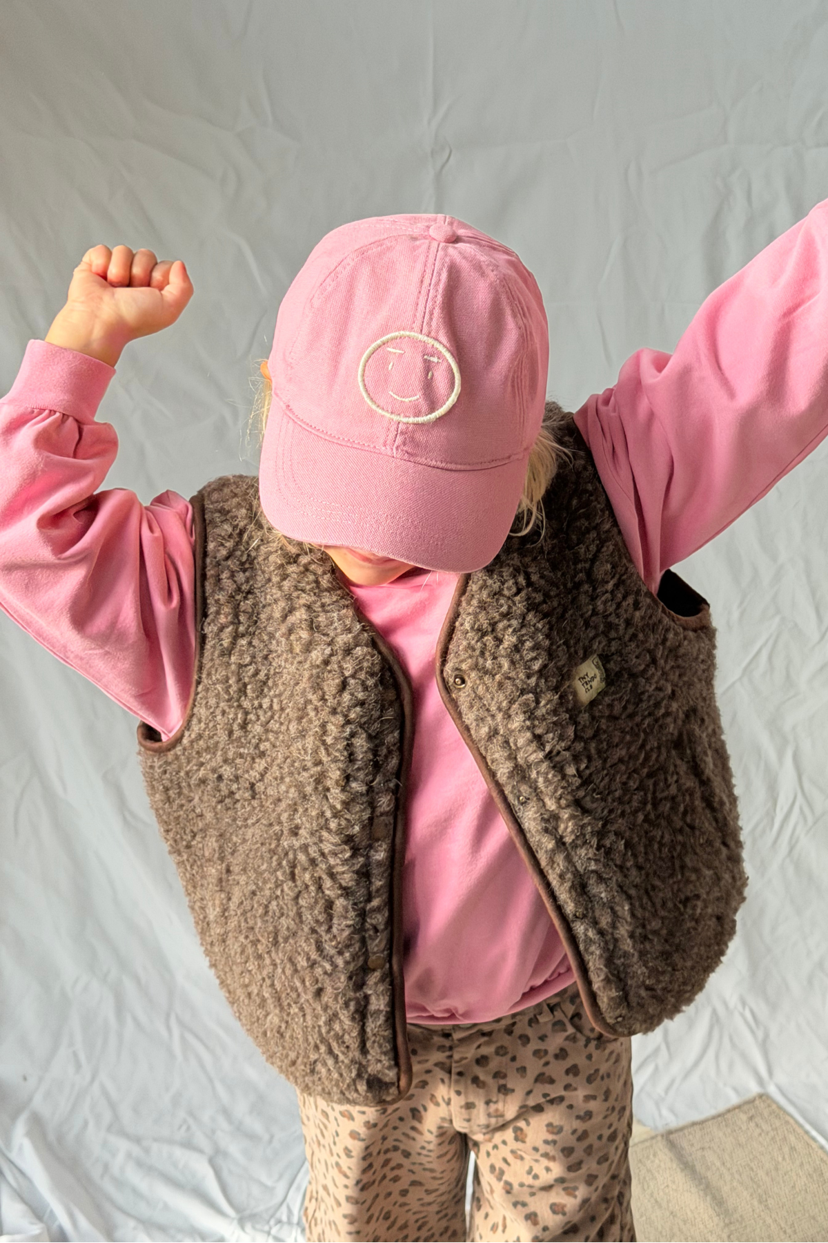 Wollweste Kids "Tiny Tornado Club" | Espresso